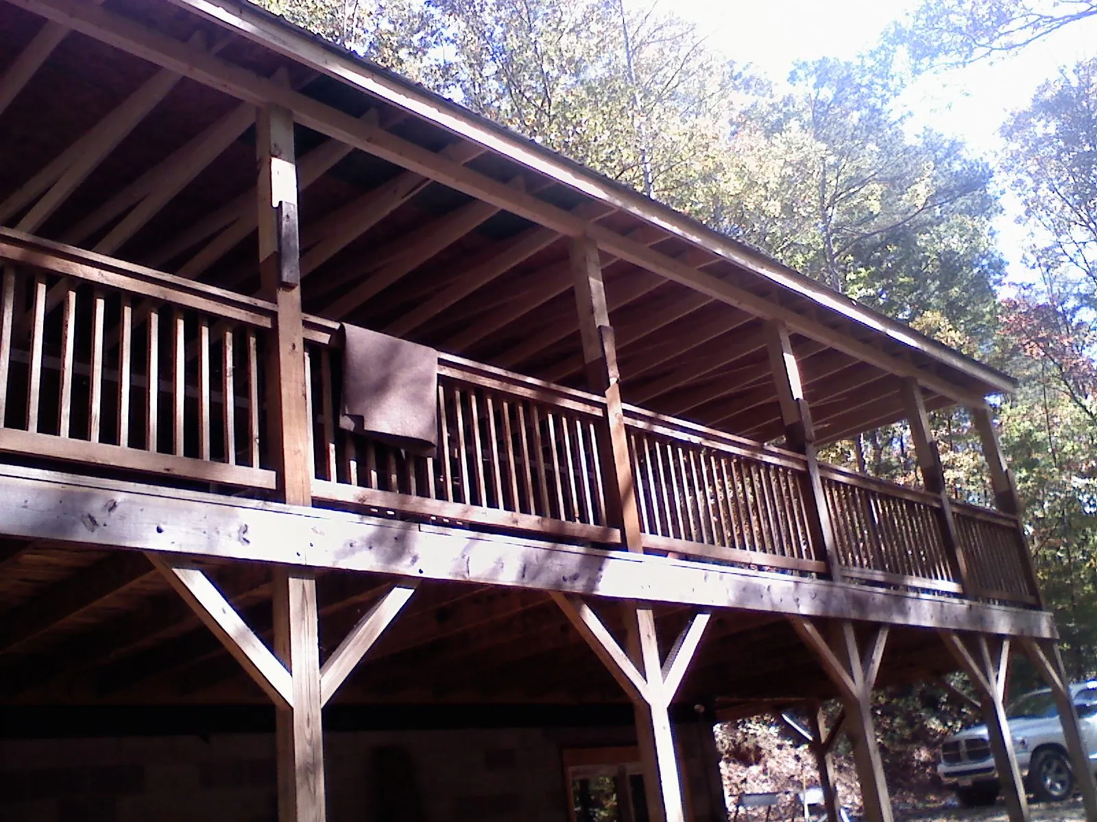 Timber framing under a new elevated porch and deck — Roof Leak Repair in Branson by Roofing Brothers